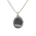 Load image into Gallery viewer, Black &amp; White Pebble pendant
