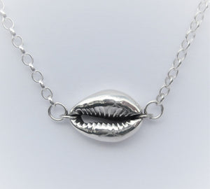 Cowrie on the horizon solid Silver