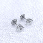 Load image into Gallery viewer, Noughts and dashes solid silver stamped studs
