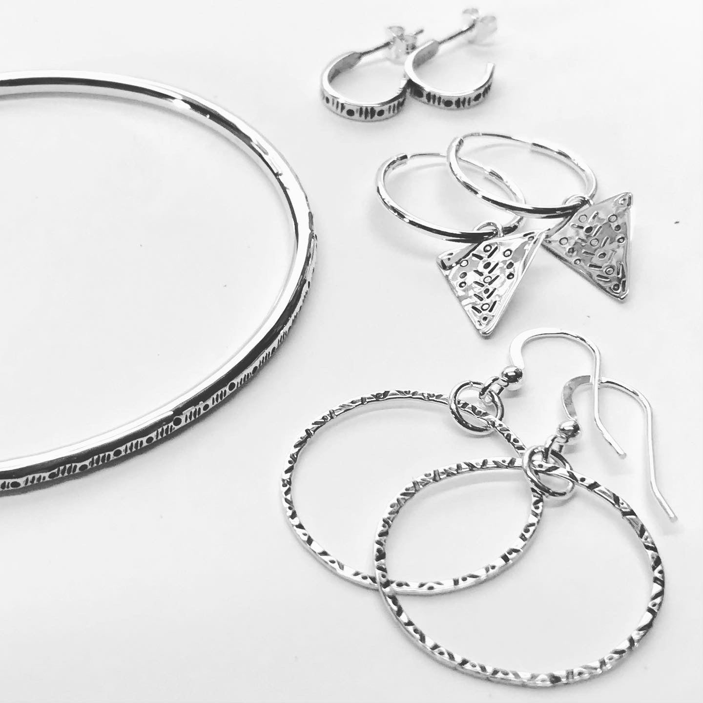 Jeiynaba sterling silver triangle earrings