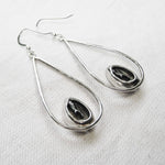 Load image into Gallery viewer, Teardrop Silver Cowrie earrings
