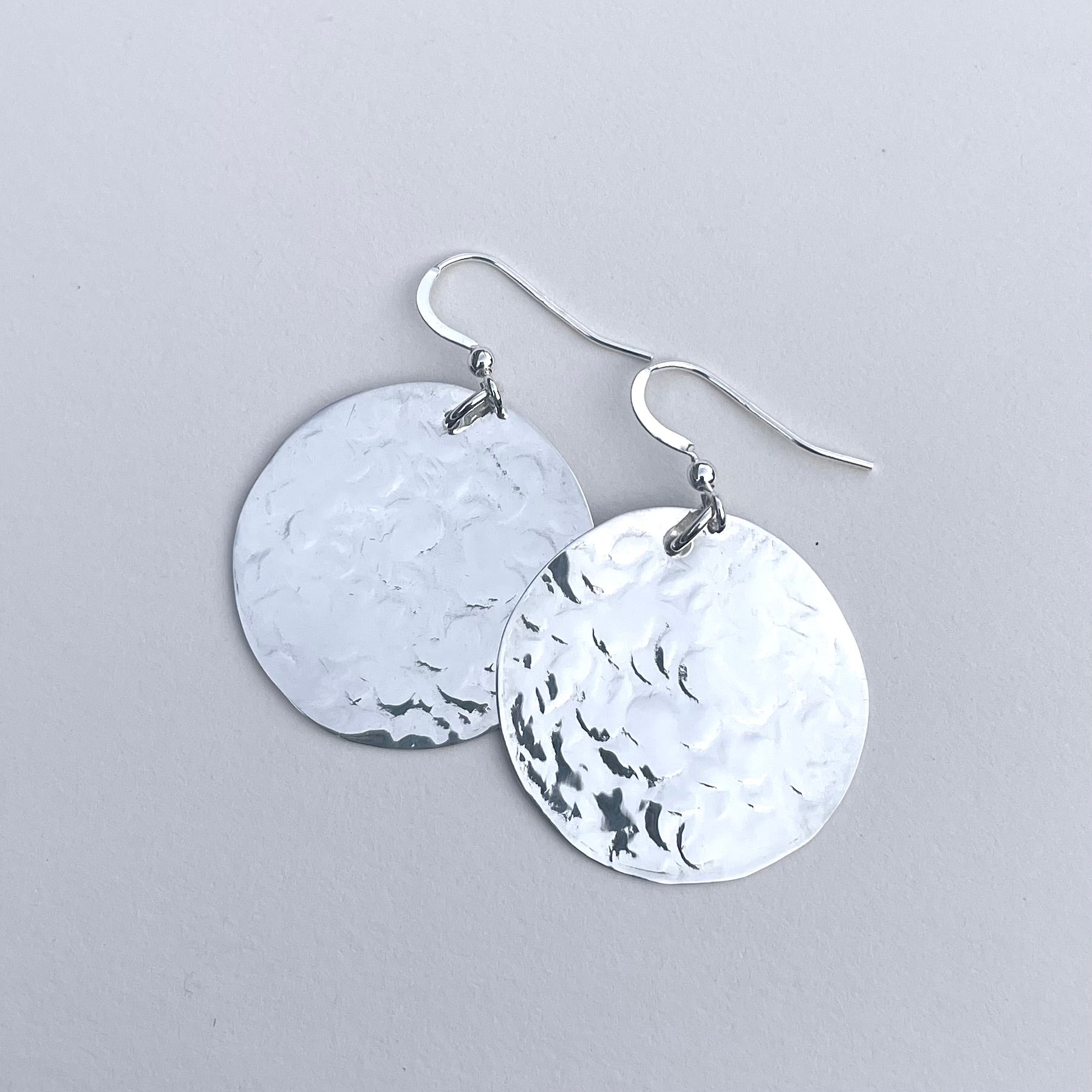 Circles texture silver disc earrings